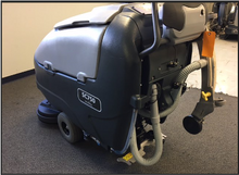 Load image into Gallery viewer, Refurbished Advance SC750™ 26D Walk-Behind Floor Scrubber Four 242 Ah wet batteries, EcoFlex™, shelf charger, pad holders