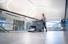 Load image into Gallery viewer, Kärcher 9.176-020.0 B 50 W Bp walk-behind floor scrubber in use